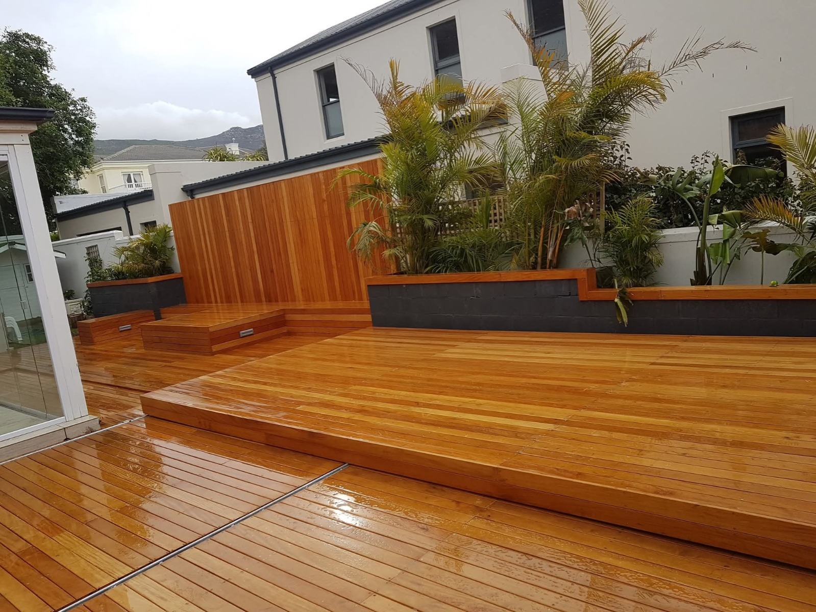 Sliding deck system over pool area - Decks & Wood Engineering